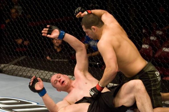 Em sua terceira luta como profissional, em abril de 2008, Cain Velasquez estreou no UFC. Em Montreal, ele precisou de apenas dois minutos para nocautear o australiano Brad Morris