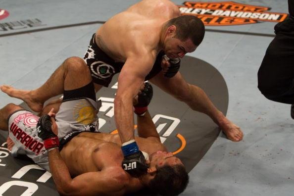 A nova vtima de Velasquez foi a lenda brasileira Rodrigo Minotauro Nogueira. Aps o nocaute no primeiro round, Cain ganhou a chance de disputar o cinturo dos pesados