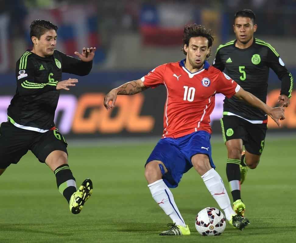 Imagens do empate entre Chile e Mxico, por 3 a 3, em Santiago