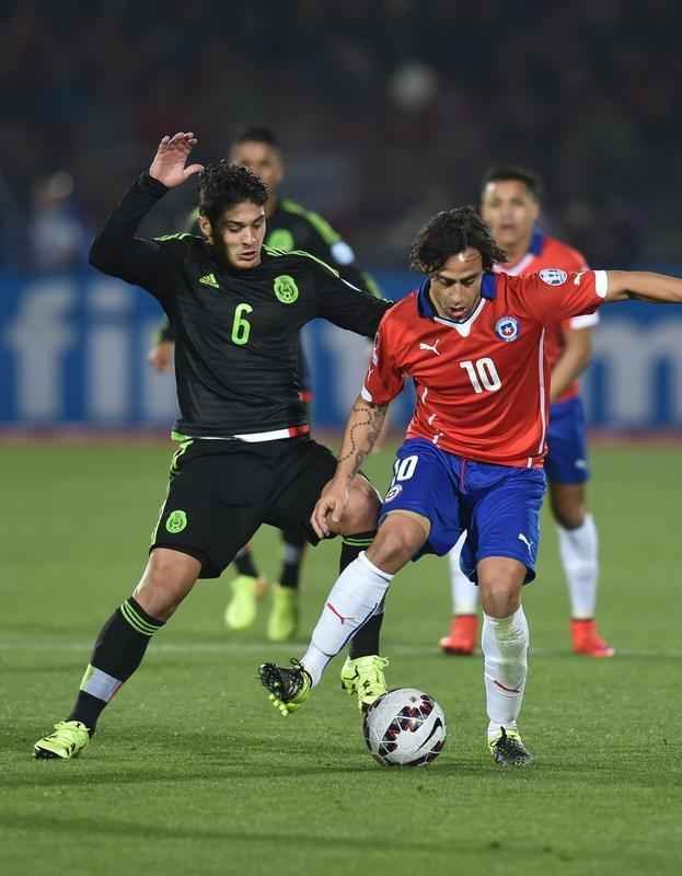 Imagens do empate entre Chile e Mxico, por 3 a 3, em Santiago
