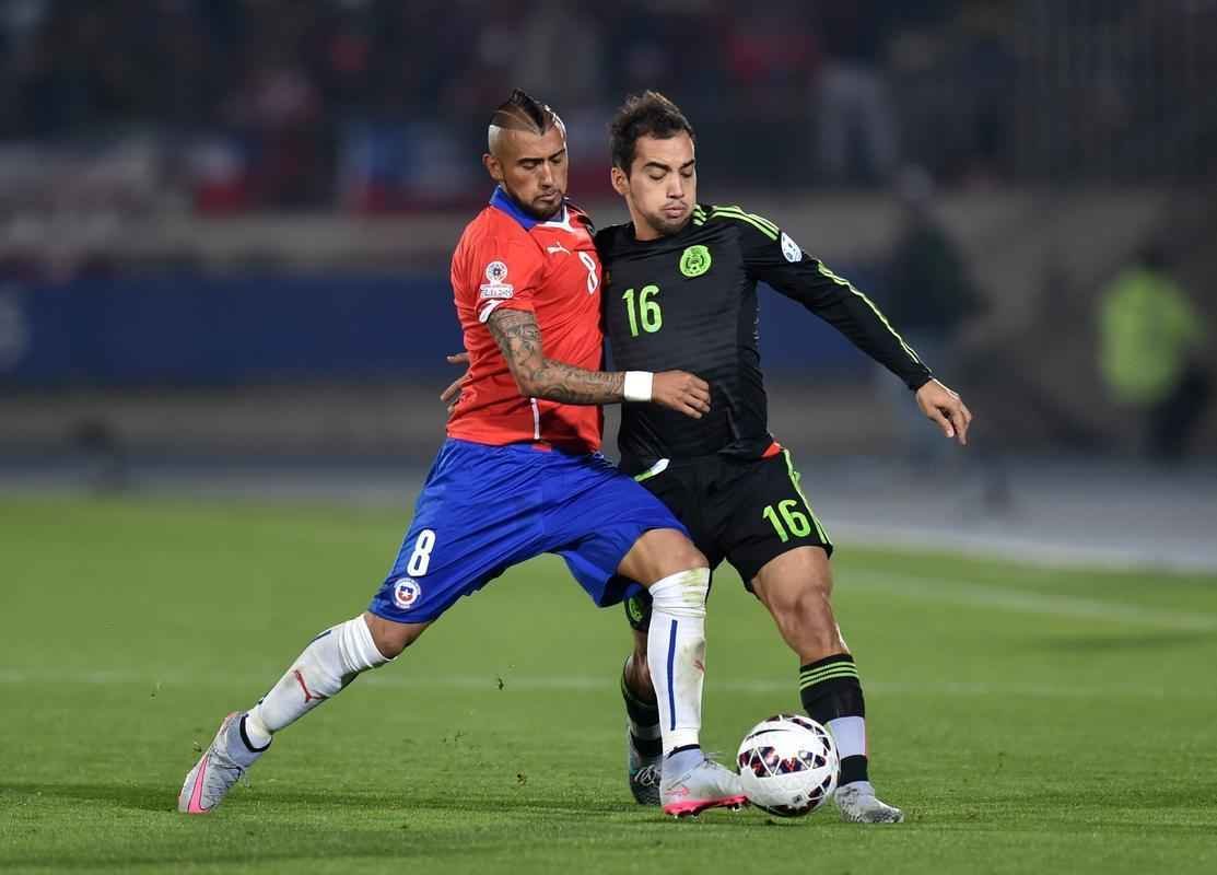 Imagens do empate entre Chile e Mxico, por 3 a 3, em Santiago