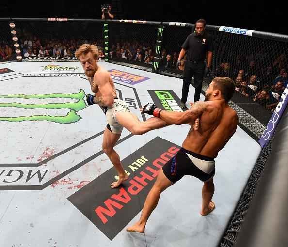 Veja imagens incrveis da vitria de Conor McGregor sobre Chad Mendes