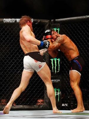 Veja imagens incríveis da vitória de Conor McGregor sobre Chad Mendes