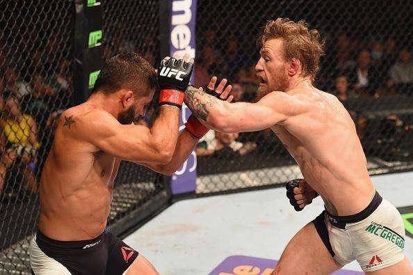 Veja imagens incríveis da vitória de Conor McGregor sobre Chad Mendes