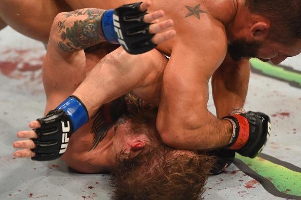 Veja imagens incríveis da vitória de Conor McGregor sobre Chad Mendes