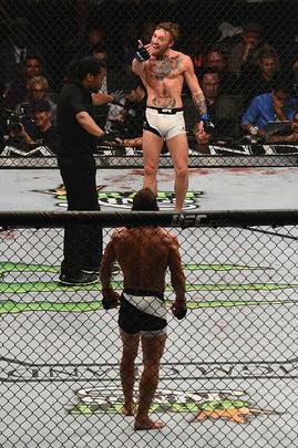 Veja imagens incríveis da vitória de Conor McGregor sobre Chad Mendes