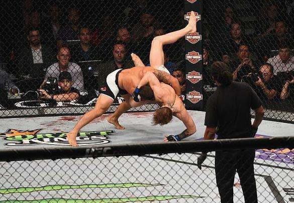 Veja imagens incríveis da vitória de Conor McGregor sobre Chad Mendes