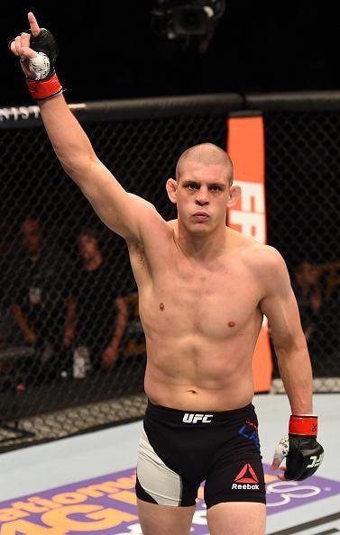 Fotos das lutas e bastidores do UFC em Chicago - Joe Lauzon (bermuda preta) derrotou Takanori Gomi por nocaute tcnico aos 2m37s do primeiro round