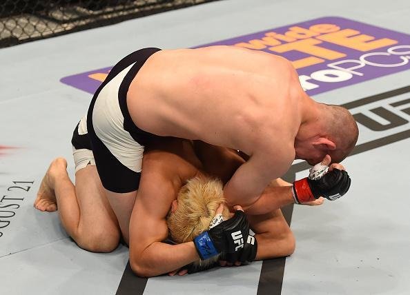 Fotos das lutas e bastidores do UFC em Chicago - Joe Lauzon (bermuda preta) derrotou Takanori Gomi por nocaute tcnico aos 2m37s do primeiro round