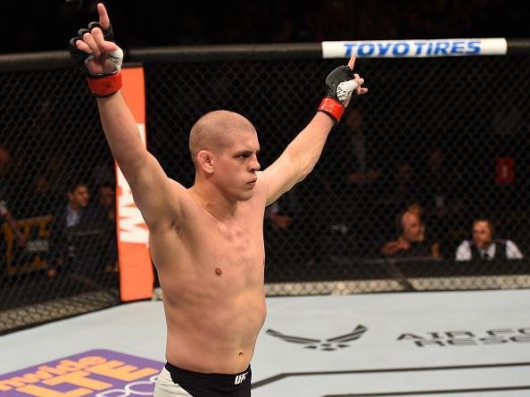 Fotos das lutas e bastidores do UFC em Chicago - Joe Lauzon (bermuda preta) derrotou Takanori Gomi por nocaute tcnico aos 2m37s do primeiro round