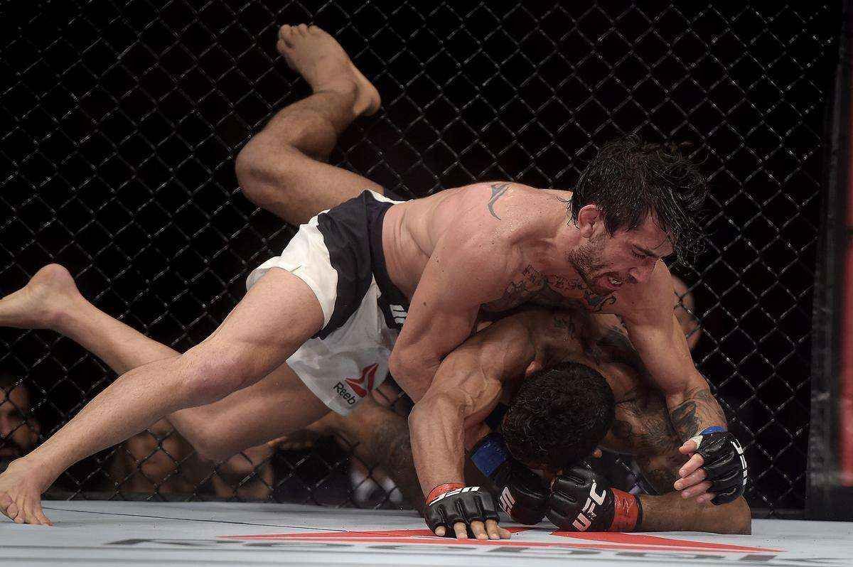 Guido Cannetti (bermuda branca) venceu Hugo 'Wolverine' Viana por deciso unnime 