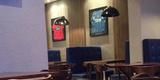 Bar do ex-cruzeirense Ramires em Joinville; local expe camisas do jogador e atrai muitos torcedores