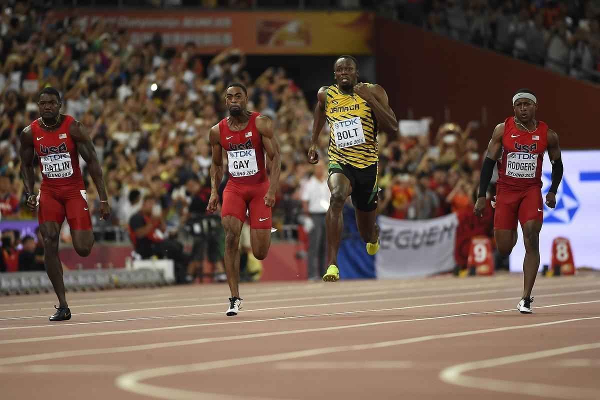 Usain Bolt venceu duelo particular em Pequim com Justin Gatlin e fez tempo 9s79, contra 9s80 do norte-americano