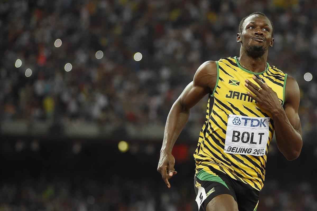 Usain Bolt venceu duelo particular em Pequim com Justin Gatlin e fez tempo 9s79, contra 9s80 do norte-americano