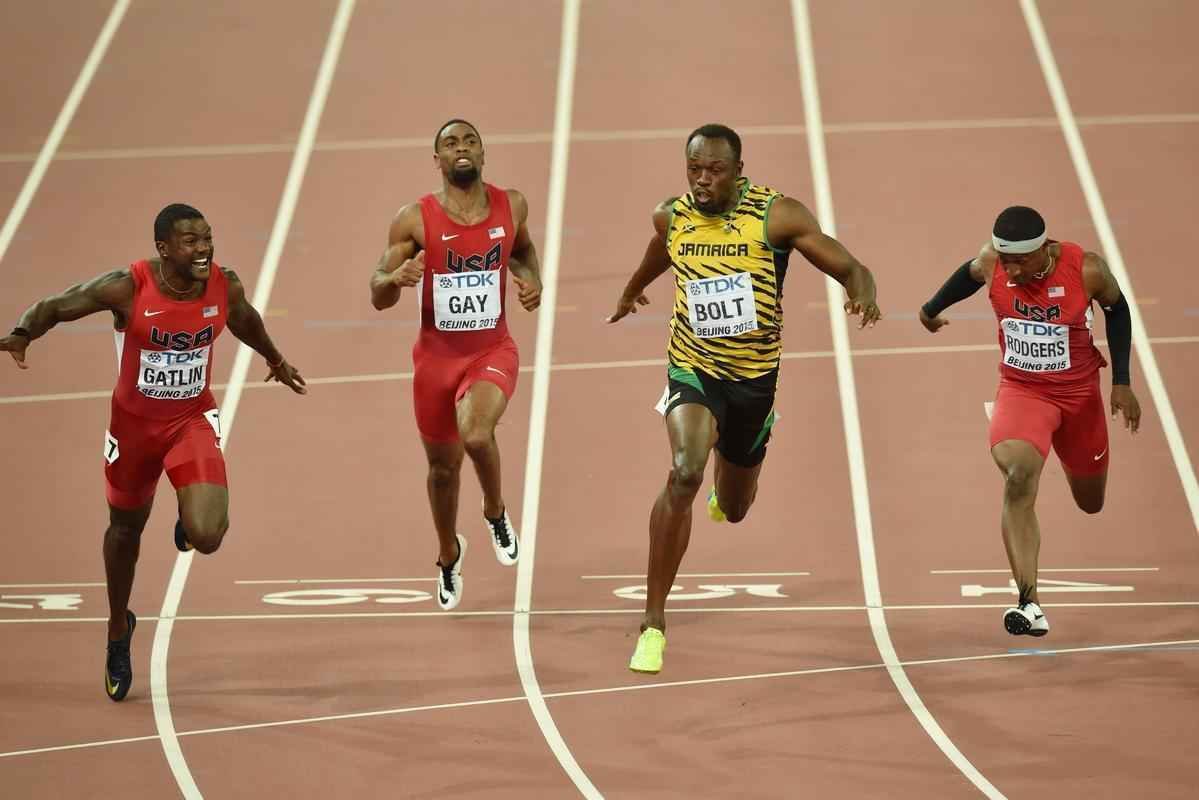 Usain Bolt venceu duelo particular em Pequim com Justin Gatlin e fez tempo 9s79, contra 9s80 do norte-americano