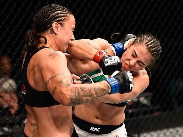 Raquel Pennington (preto) bateu Jssica Andrade por finalizao no UFC 191