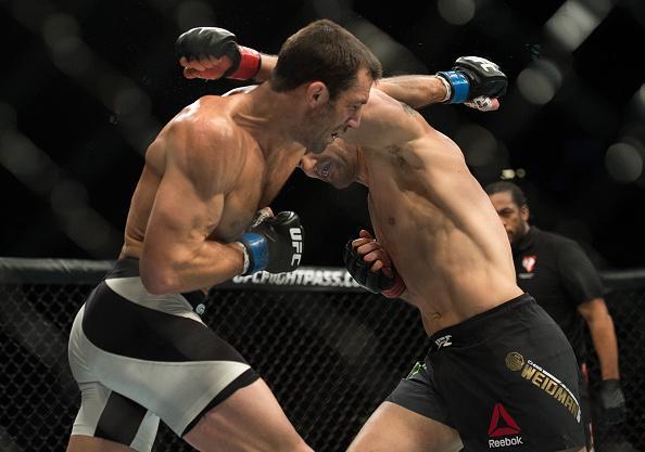 Fotos da batalha entre Luke Rockhold e Chris Weidman