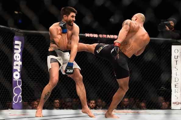 Robbie Lawler venceu Carlos Condit por deciso dividida e manteve o cinturo dos meio-mdios