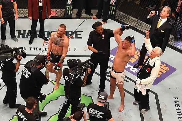 Nate Diaz vence Conor McGregor por finalizao na luta principal do UFC 196
