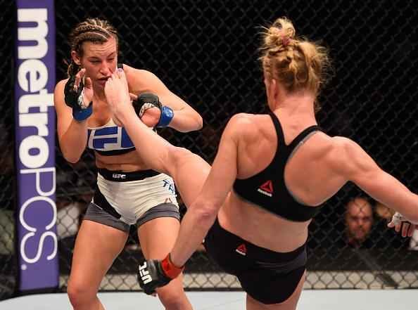 Miesha Tate finaliza Holly Holm com mata-leo, no quinto round, e conquista cinturo peso galo