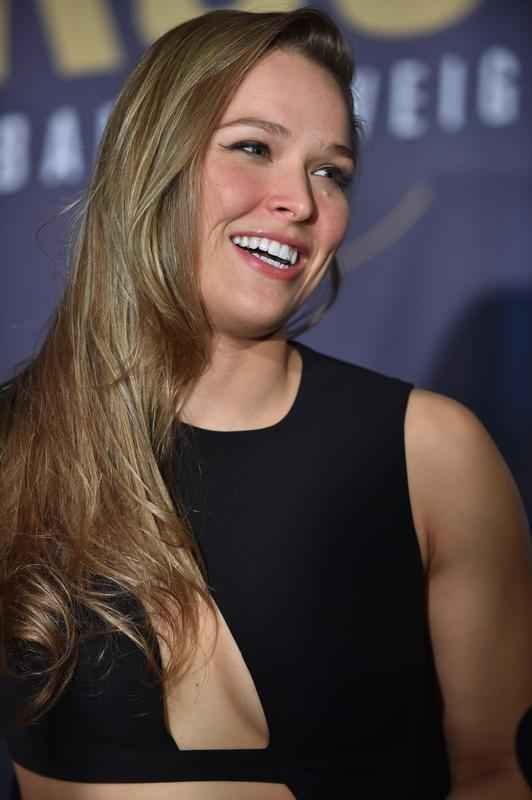 Veja fotos da norte americana Ronda Rousey, que j disputou os Jogos quando ainda lutava jud