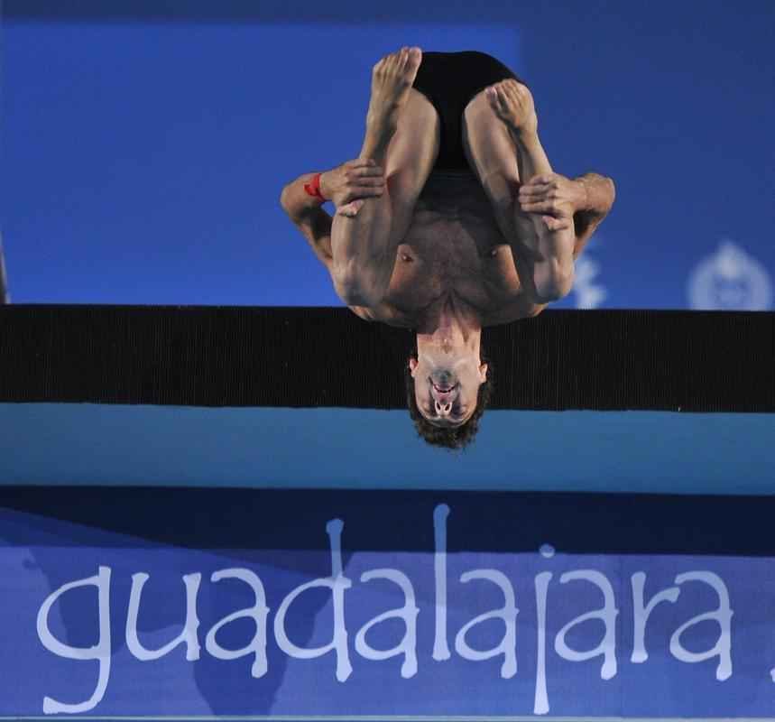 Veja fotos do muso Hugo Parisi, brasileiro dos saltos ornamentais