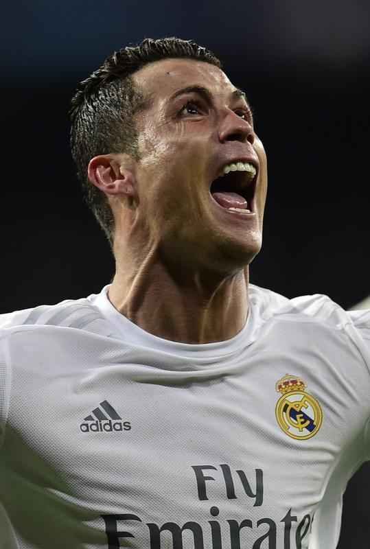 Cristiano Ronaldo comemora seu terceiro gol sobre o Wolfsburg pelas quartas de final da Liga