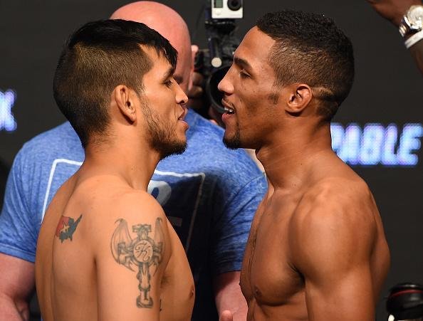 Peso-leve (70,8kg*): Efrain Escudero (70,5kg)x Kevin Lee (70,8kg) 