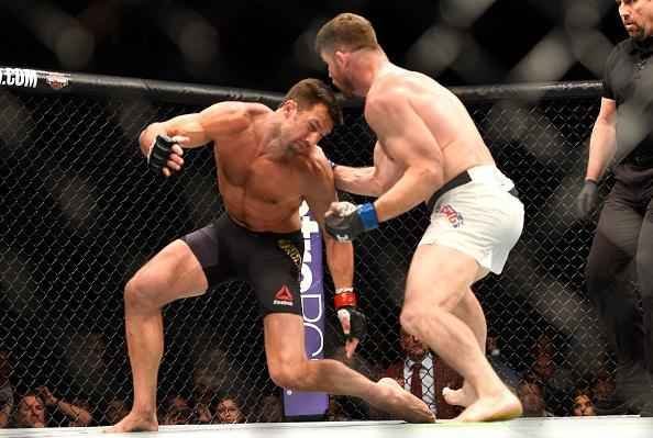 Considerado azaro na luta principal do UFC 199, em Los Angeles, Michael Bisping surpreende Luke Rockhold e conquista o cinturo do peso mdio, com nocaute arrasador no primeiro round 