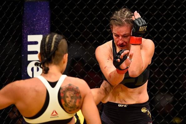 Fotos da grande vitria de Amanda Nunes pelo cinturo do UFC