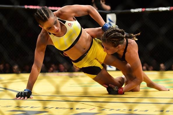 Fotos da grande vitria de Amanda Nunes pelo cinturo do UFC