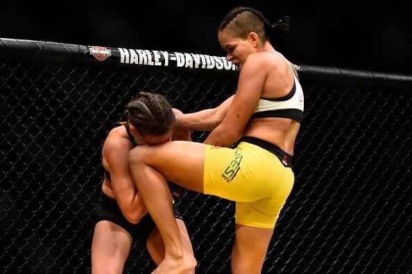 Fotos da grande vitria de Amanda Nunes pelo cinturo do UFC