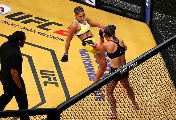 Fotos da grande vitria de Amanda Nunes pelo cinturo do UFC