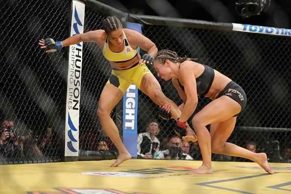 Fotos da grande vitria de Amanda Nunes pelo cinturo do UFC