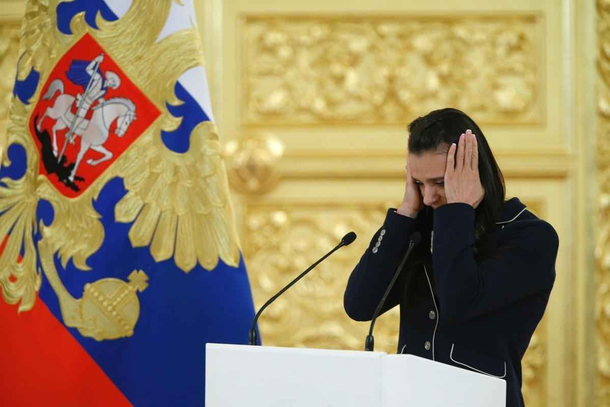 Atletas russos so recepcionados pelo presidente Vladimir Putin