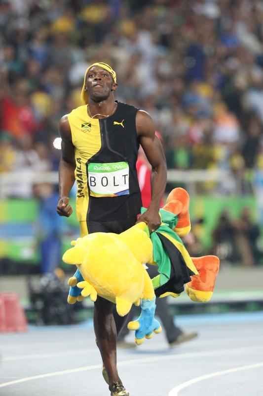 Sequncia de fotos de Rodrigo Clemente, do Estado de Minas, com a vitria de Bolt no Rio