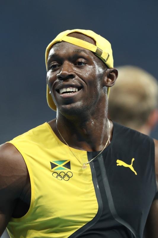 Sequncia de fotos de Rodrigo Clemente, do Estado de Minas, com a vitria de Bolt no Rio