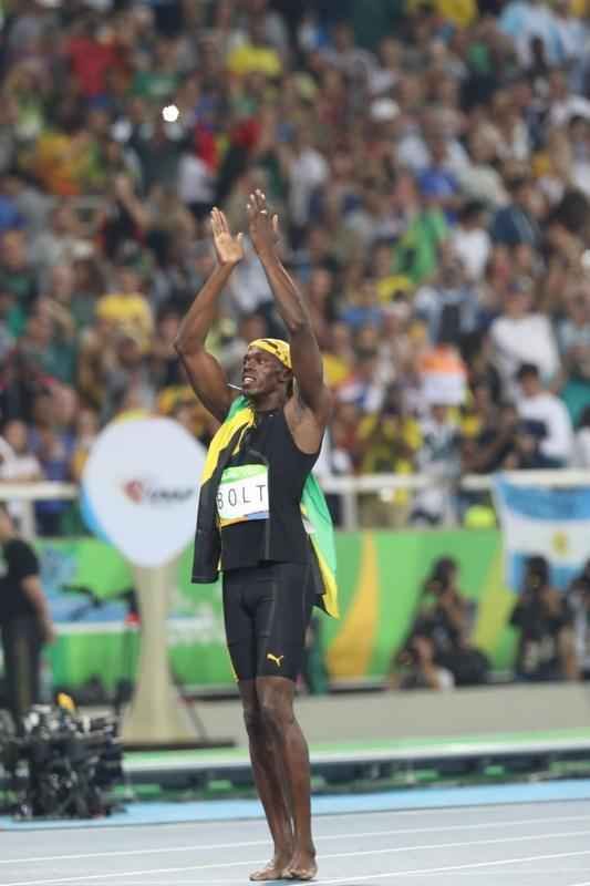 Sequncia de fotos de Rodrigo Clemente, do Estado de Minas, com a vitria de Bolt no Rio