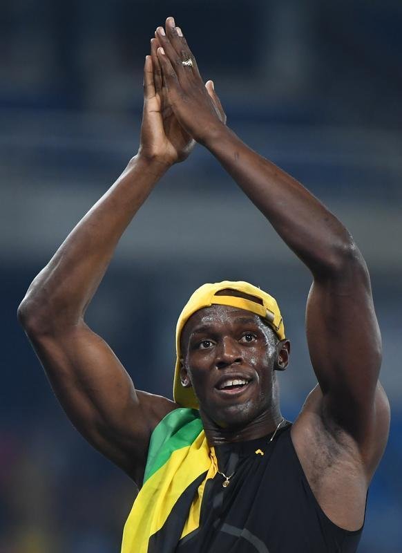 Usain Bolt comemorou tricampeonato olmpico com pblico no Engenho, no Rio