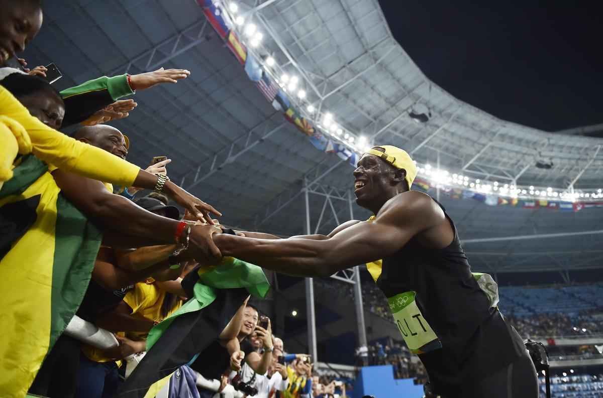 Usain Bolt comemorou tricampeonato olmpico com pblico no Engenho, no Rio