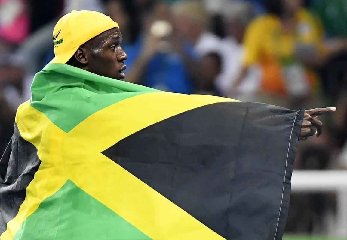Usain Bolt comemorou tricampeonato olmpico com pblico no Engenho, no Rio