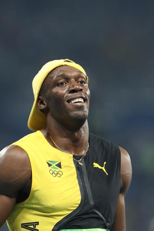 Usain Bolt comemorou tricampeonato olmpico com pblico no Engenho, no Rio