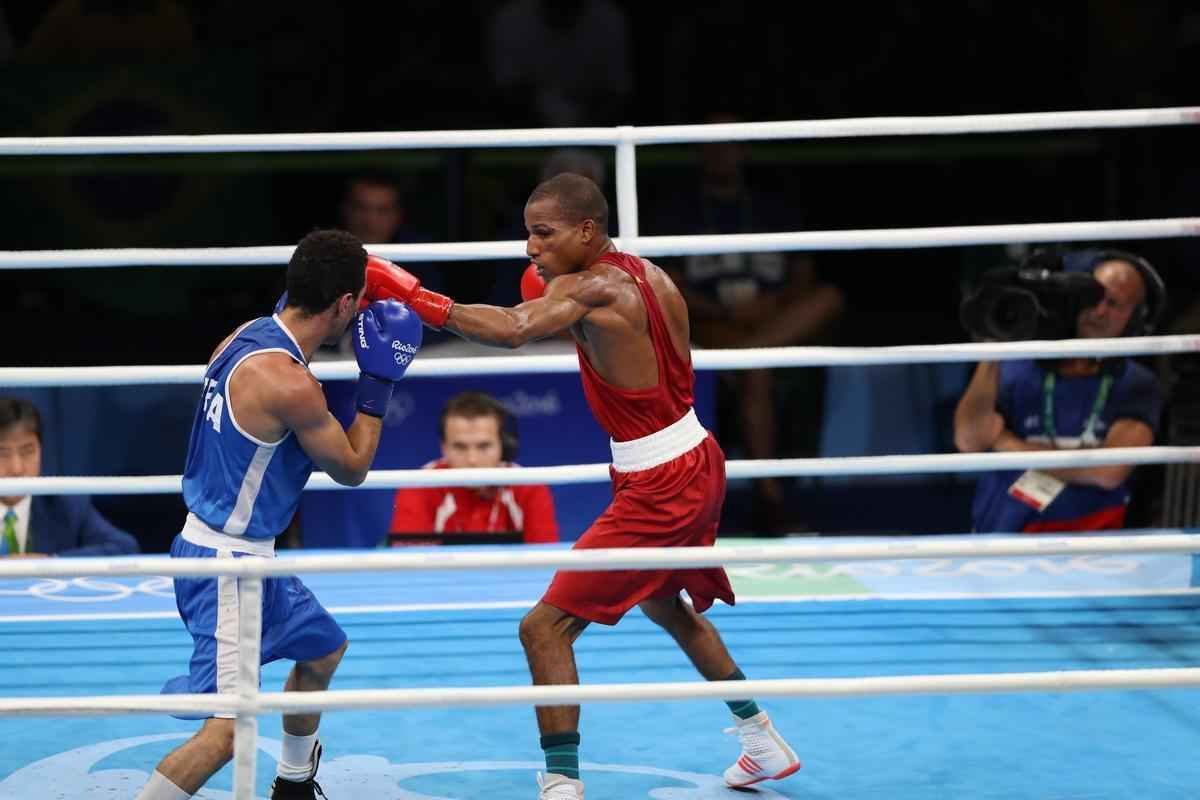 Imagens do combate em que Robson Conceio conquistou o ouro no Rio