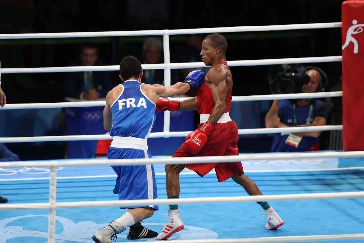 Imagens do combate em que Robson Conceio conquistou o ouro no Rio