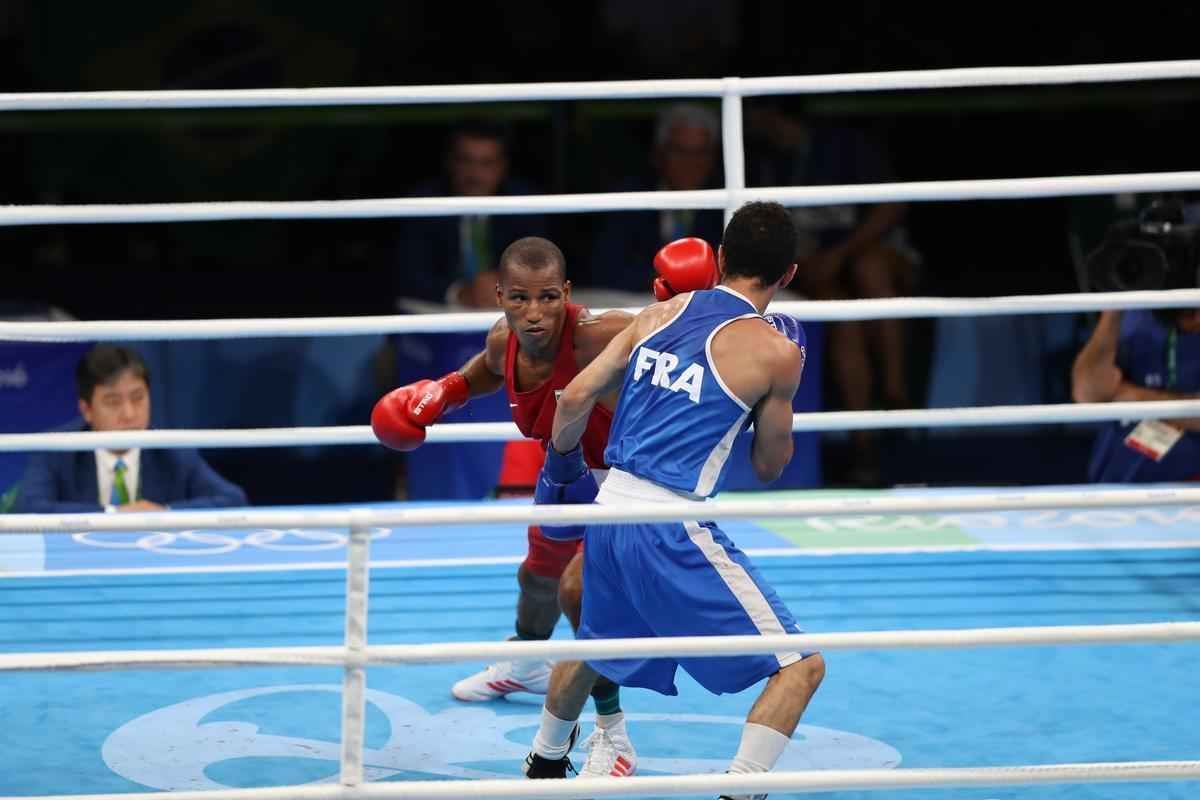 Imagens do combate em que Robson Conceio conquistou o ouro no Rio
