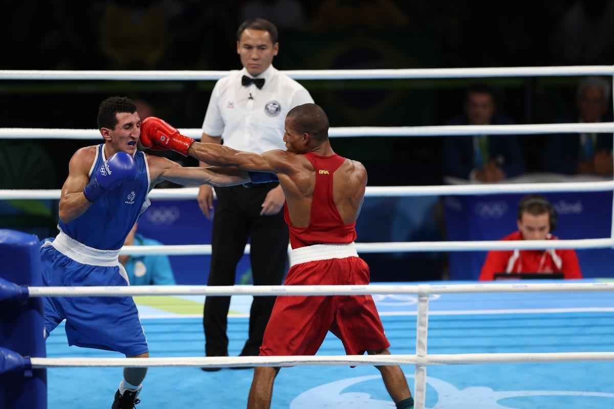 Imagens do combate em que Robson Conceio conquistou o ouro no Rio