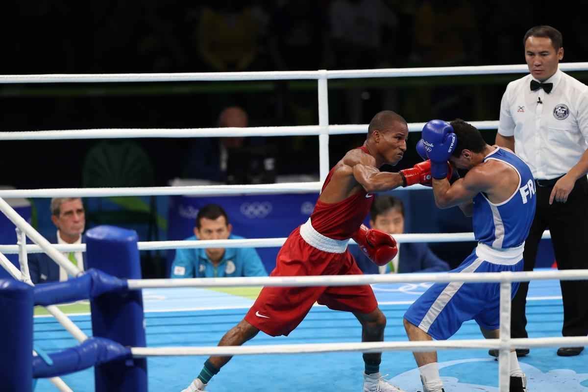 Imagens do combate em que Robson Conceio conquistou o ouro no Rio