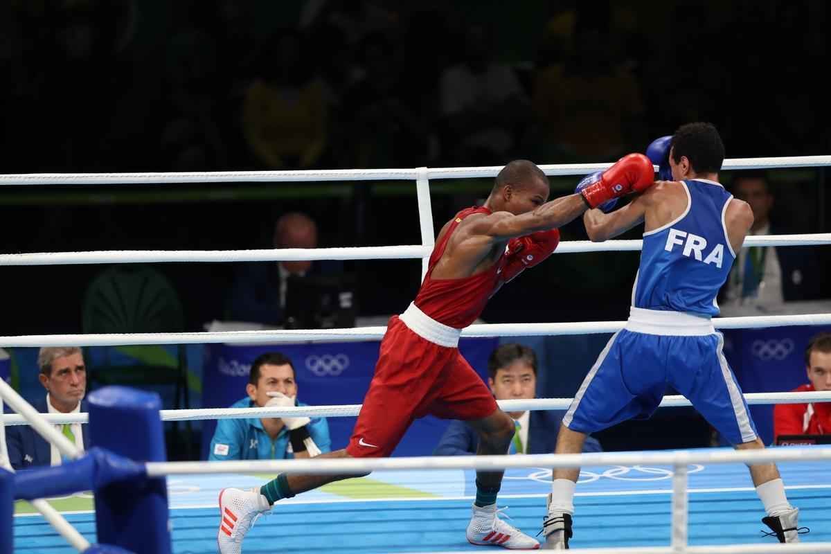 Imagens do combate em que Robson Conceio conquistou o ouro no Rio