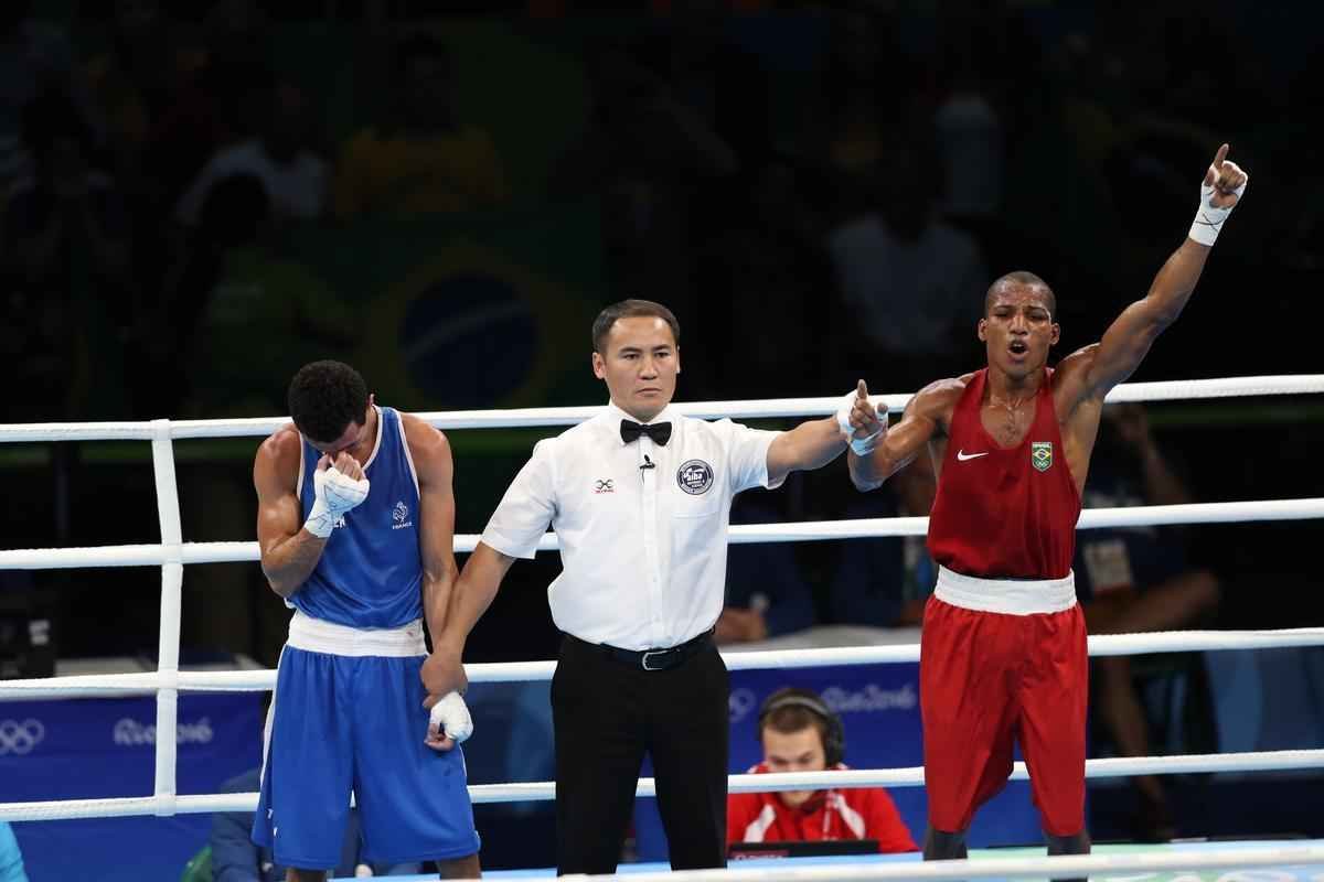 Imagens do combate em que Robson Conceio conquistou o ouro no Rio
