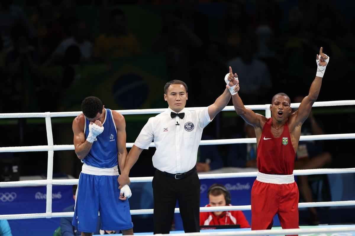 Imagens do combate em que Robson Conceio conquistou o ouro no Rio